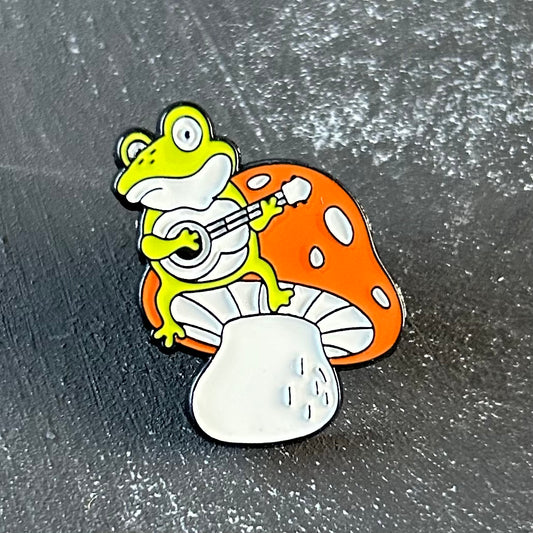 Musical Frog on Mushroom Enamel Pin